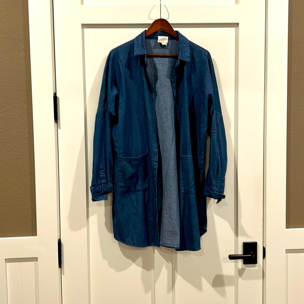 Lightweight denim shirt could be dress with buttons on the front and sides